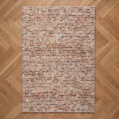 Aurelia Brick handloom bouclé wool rug in warm earthy brick tones, plush 15 mm pile woven in India